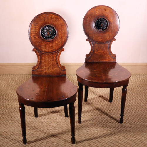 Pair Of Oak Lion Hall Chairs (1)