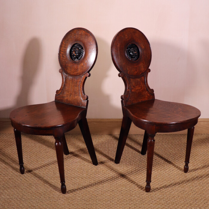 Pair Of Oak Lion Hall Chairs (3)